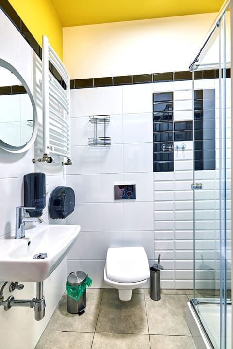 Family Room, Private Bathroom | Bathroom | Shower, hair dryer, towels