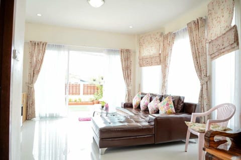 Three Bedrooms House | Living area | Flat-screen TV