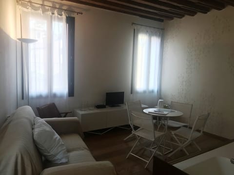 Apartment, 1 Bedroom | Living area | Flat-screen TV