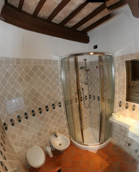 Shower, free toiletries, hair dryer, slippers