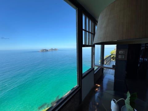 Suite La Mer | Minibar, in-room safe, blackout drapes, iron/ironing board