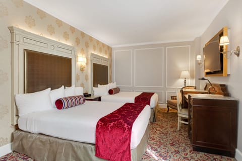 Deluxe Room, 2 Queen Beds | In-room safe, desk, blackout drapes, iron/ironing board