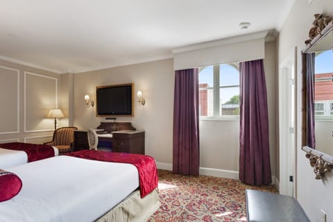 Deluxe Room, 2 Queen Beds | In-room safe, desk, blackout drapes, iron/ironing board