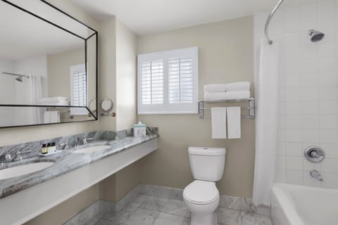 Combined shower/tub, designer toiletries, hair dryer, bathrobes