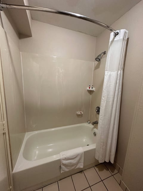 Room, 2 Double Beds, Non Smoking | Bathroom | Combined shower/tub, free toiletries, hair dryer, towels