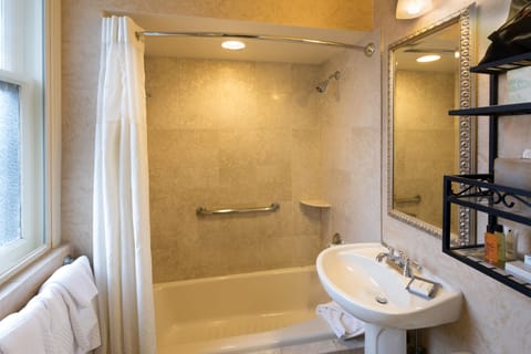 Designer toiletries, hair dryer, towels