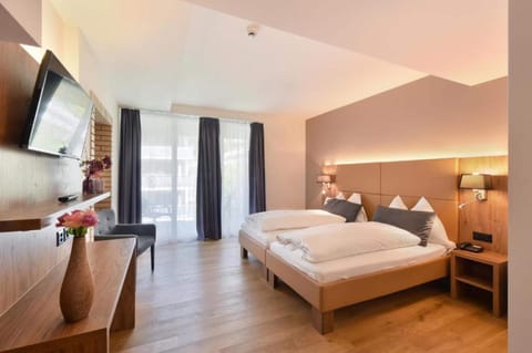 Superior Double Room | Minibar, in-room safe, desk, laptop workspace