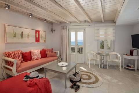 Deluxe Suite, Sea View | Living area | 50-inch Smart TV with satellite channels, TV