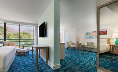 Suite, 1 King Bed with Sofa bed (Palo Verde) | Living area | TV, pay movies