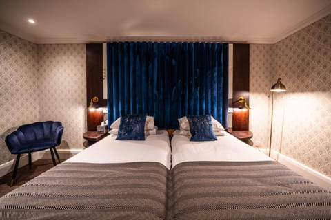 Hypo-allergenic bedding, in-room safe, desk, soundproofing