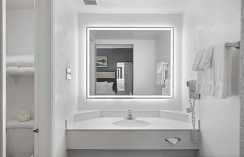 Eco-friendly toiletries, hair dryer, towels, soap