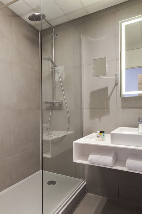 Eco-friendly toiletries, hair dryer, towels