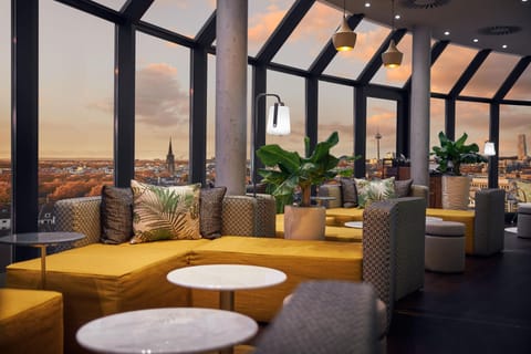 Rooftop bar, garden views, open daily
