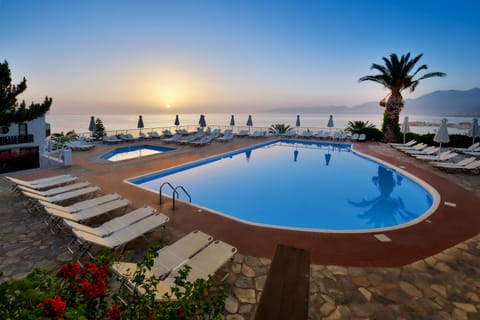2 outdoor pools, pool umbrellas, sun loungers