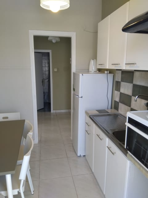 Apartment (4 Adults) | Private kitchenette | Fridge, stovetop, electric kettle, highchair