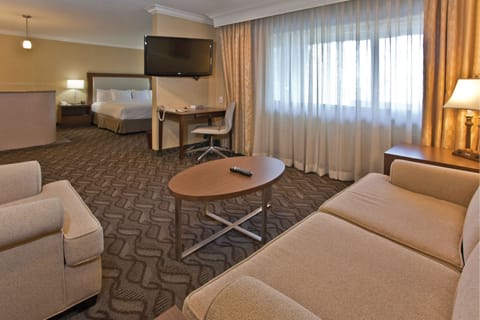Suite, 1 King Bed, Non Smoking | Hypo-allergenic bedding, in-room safe, desk, blackout drapes