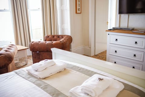 Deluxe Triple Room, Sea View - 1st Floor | Premium bedding, desk, iron/ironing board, free wired internet