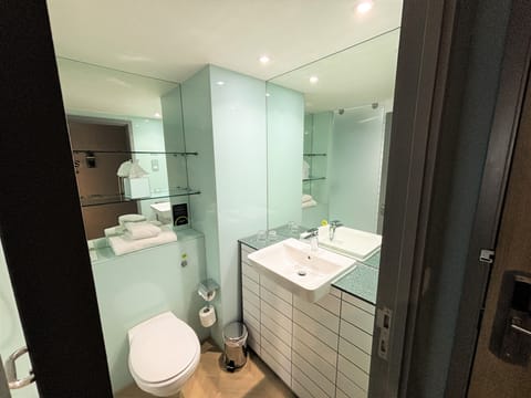 Shower, rainfall showerhead, hair dryer, towels