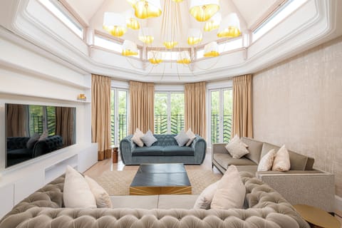 Presidential Penthouse | Living area | 40-inch Smart TV with digital channels