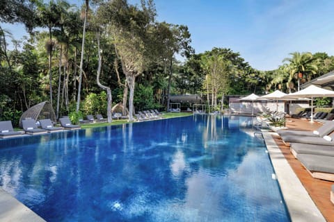 Outdoor pool, open 6 AM to 9 PM, pool umbrellas, sun loungers