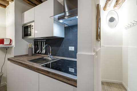 Apartment, 1 Bedroom | Private kitchenette | Full-size fridge, microwave, stovetop, dishwasher