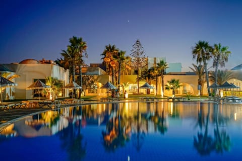 Indoor pool, outdoor pool, pool umbrellas, sun loungers