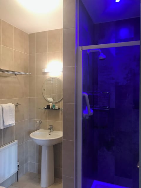 Shower, free toiletries, hair dryer, towels