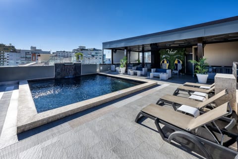 Outdoor pool, pool umbrellas, sun loungers