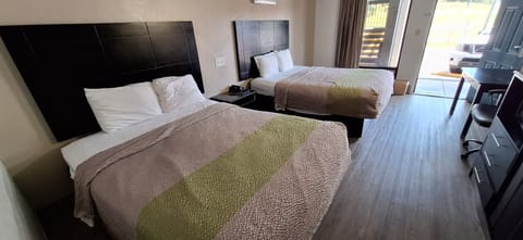 Premium bedding, desk, blackout drapes, iron/ironing board