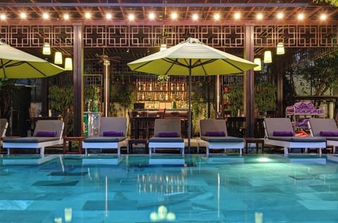 Outdoor pool, open 6 AM to 7:00 PM, pool umbrellas, sun loungers