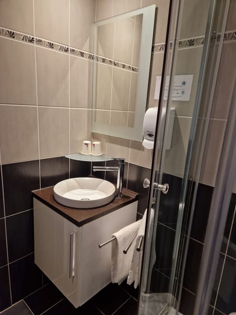 Standard Double Room | Bathroom | Shower, hair dryer, towels, soap