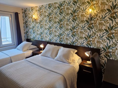 Standard Triple Room | Desk, blackout drapes, iron/ironing board, free WiFi