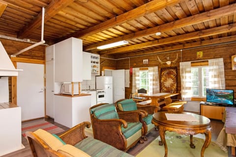 Cottage, Sauna | Living area | Flat-screen TV