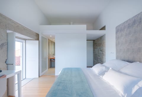 Premium bedding, down comforters, memory foam beds, desk