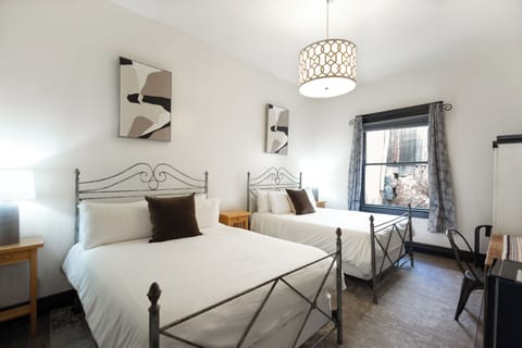 Deluxe Room, 2 Queen Beds | Premium bedding, down comforters, individually decorated