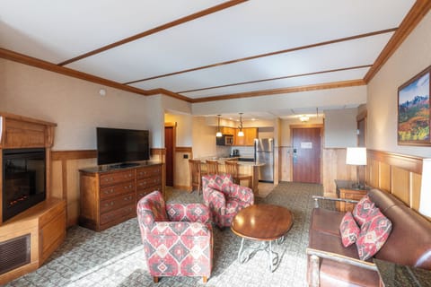 Premium Suite, 1 King Bed with Sofa bed, Kitchenette, Mountain View | Living area | 32-inch TV with cable channels
