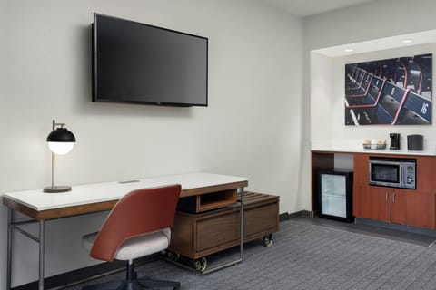 49-inch TV with cable channels, pay movies