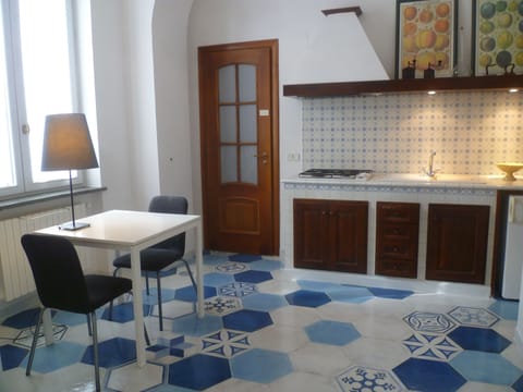 Studio, 1 Bedroom | Private kitchenette | Shared fridge