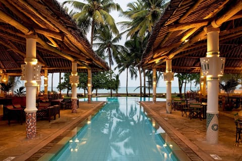 Outdoor pool, pool umbrellas, sun loungers