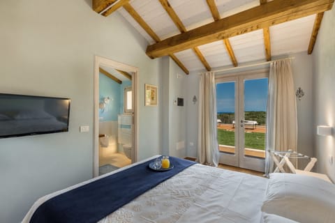 Deluxe Double Room, Sea View | Premium bedding, in-room safe, individually decorated, desk