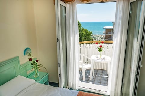 Classic Double or Twin Room, Balcony, Partial Sea View | Minibar, in-room safe, soundproofing, bed sheets