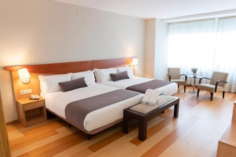 Family Quadruple Room | Desk, blackout drapes, iron/ironing board, free WiFi