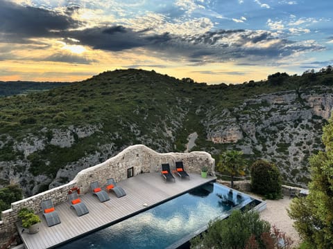 Outdoor pool, a heated pool, sun loungers