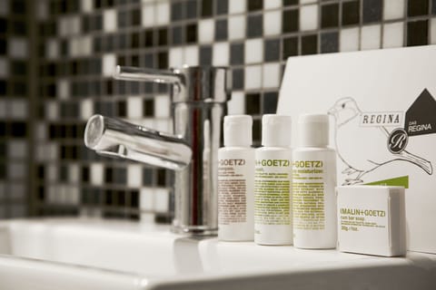 Designer toiletries, hair dryer, towels