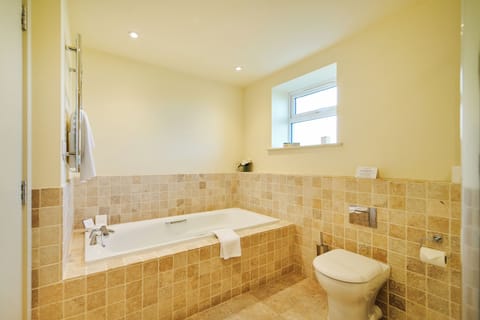 Separate tub and shower, free toiletries, hair dryer, towels