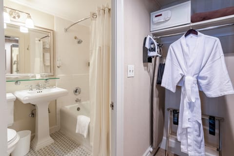 Shower, designer toiletries, hair dryer, bathrobes