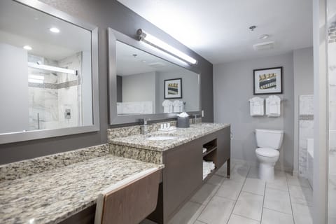 Suite, 1 Bedroom | Bathroom | Combined shower/tub, designer toiletries, hair dryer, towels