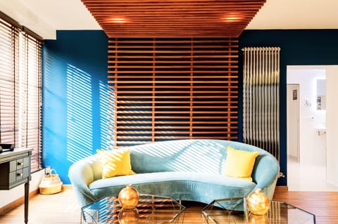 Romantic Suite, Hot Tub | Living area | Flat-screen TV