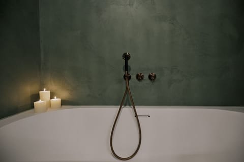 Design Studio Suite, 1 King Bed, Garden Area | Bathroom | Designer toiletries, hair dryer, bathrobes, slippers