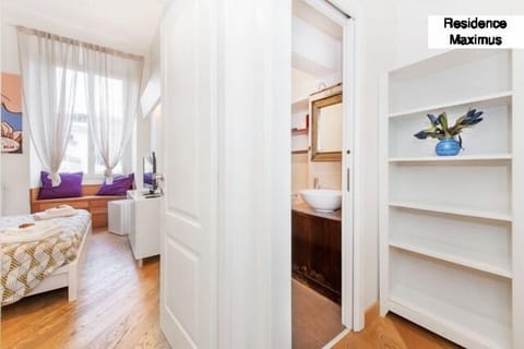 Premium bedding, down comforters, minibar, in-room safe